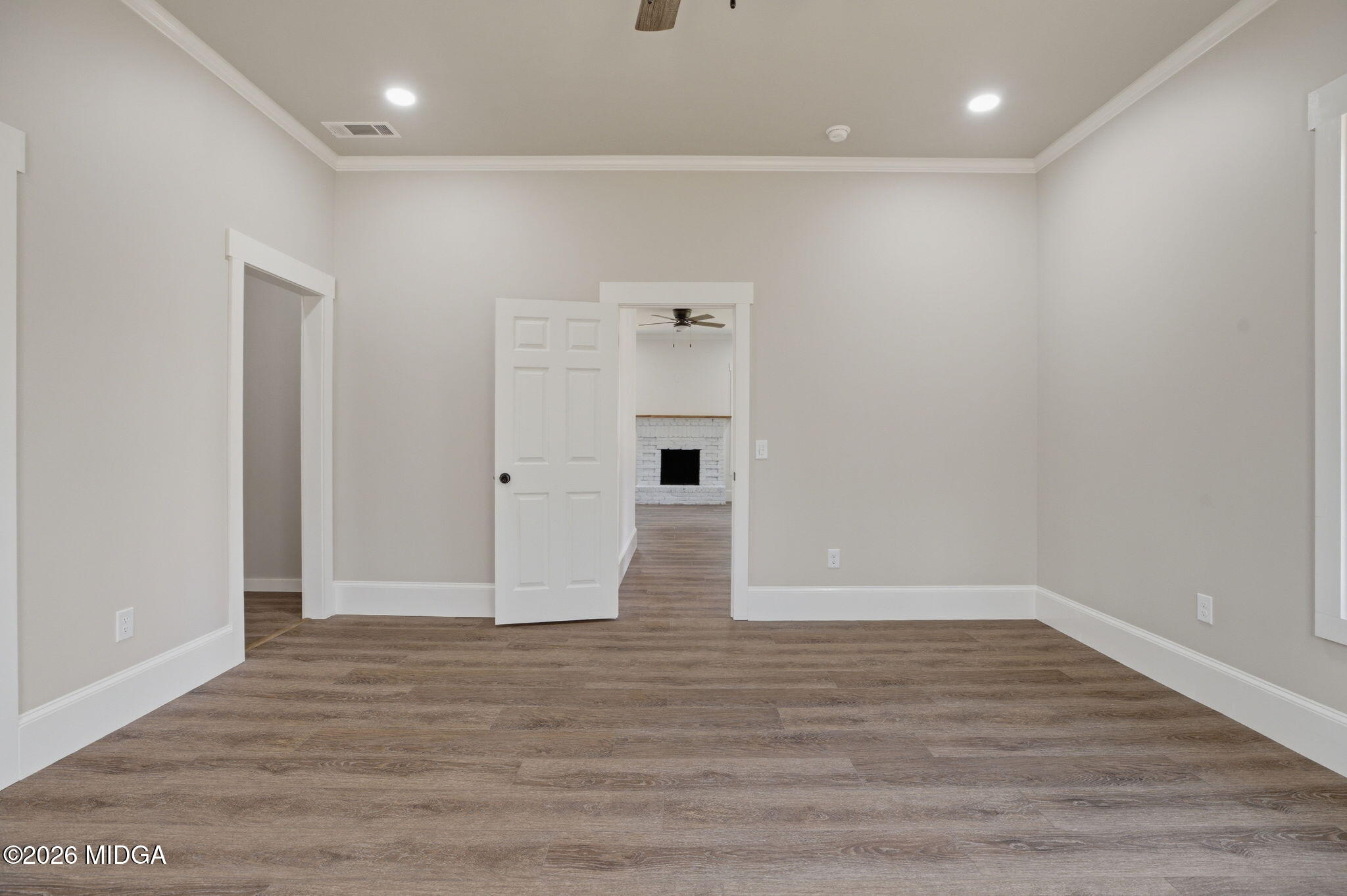 3181 Dames Ferry Road Forsyth, GA 31029 - Photo 26 of 36 wooden floor in an empty room with wooden floor