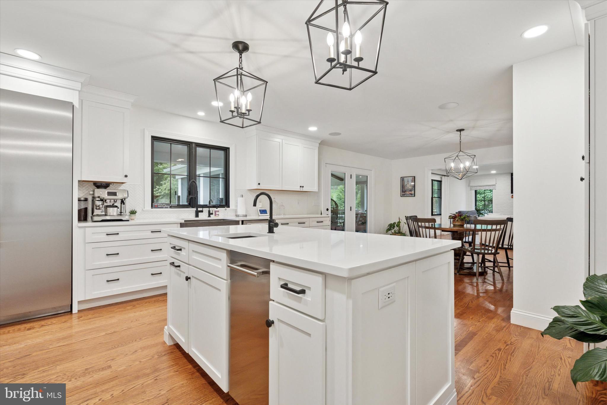 610 Dorset Road Devon, PA 19333 - Photo 28 of 54 a kitchen with a sink and dishwasher with white cabinets