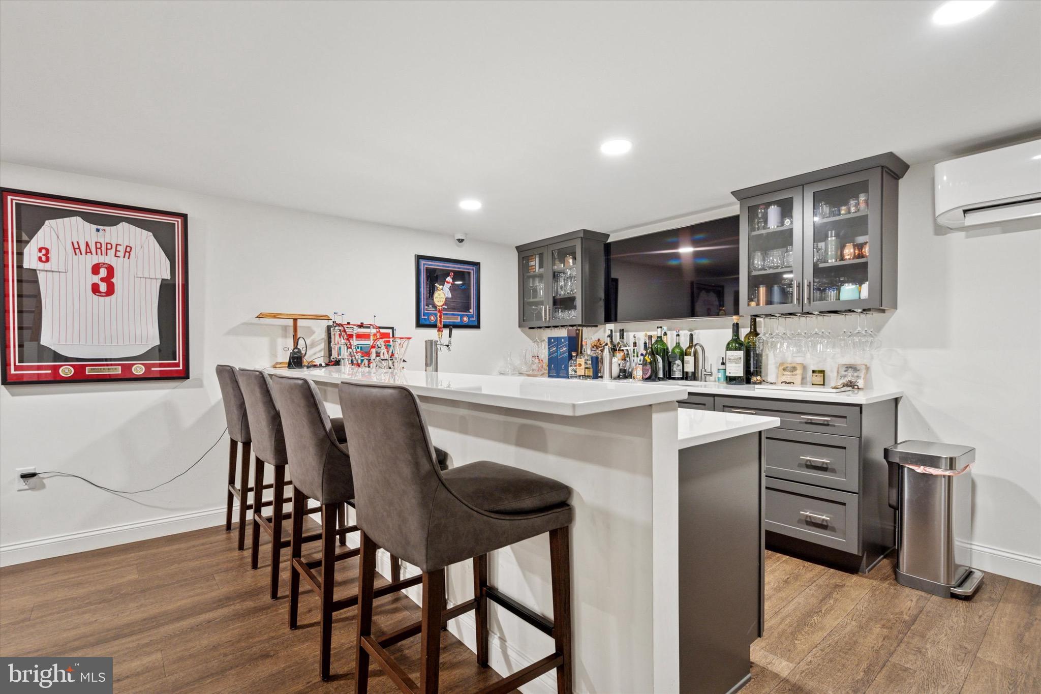 610 Dorset Road Devon, PA 19333 - Photo 34 of 54 a kitchen with kitchen island a dining table and chairs
