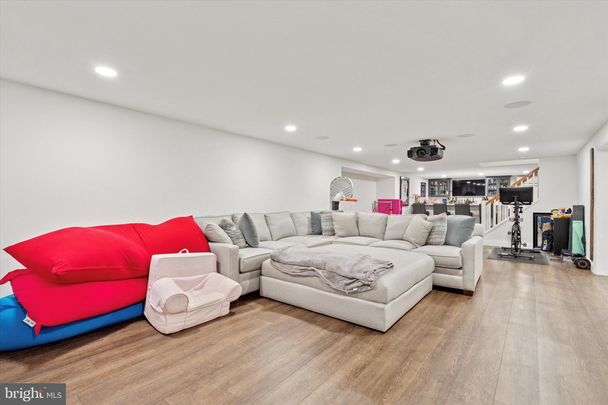610 Dorset Road Devon, PA 19333 - Photo 36 of 54 a living room with furniture and a wooden floor