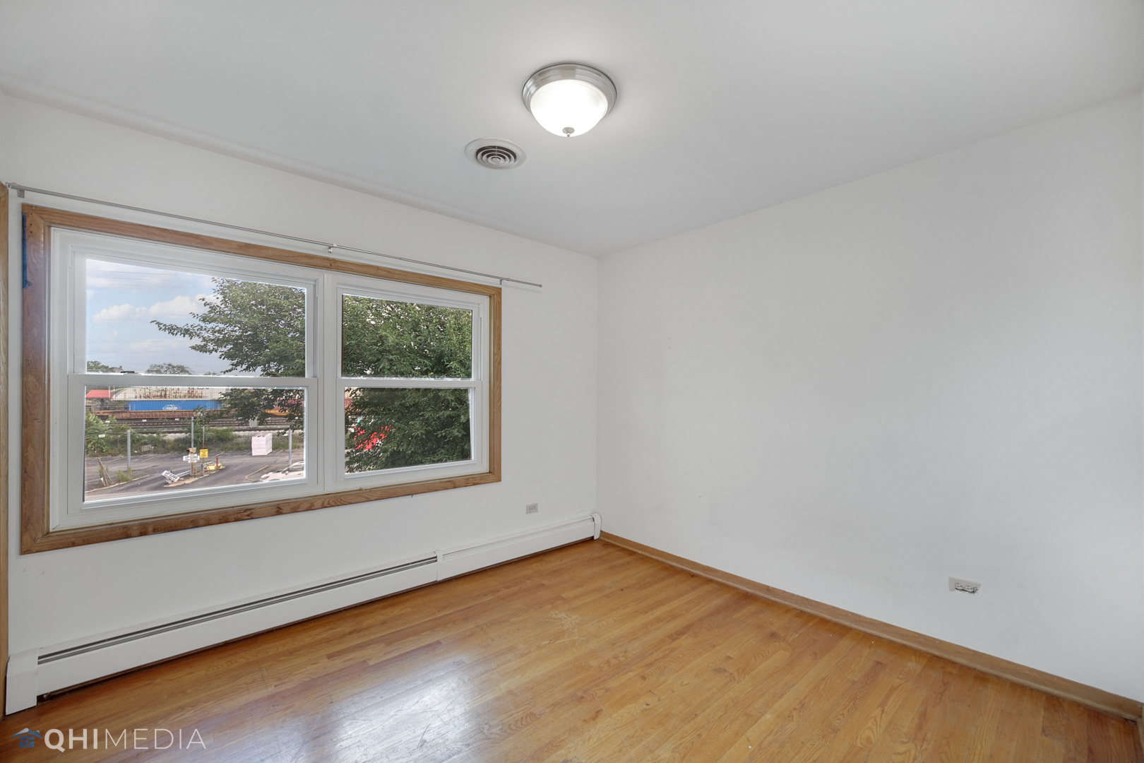 18104 Park Avenue Homewood, IL 60430 - Photo 14 of 26 an empty room with a window