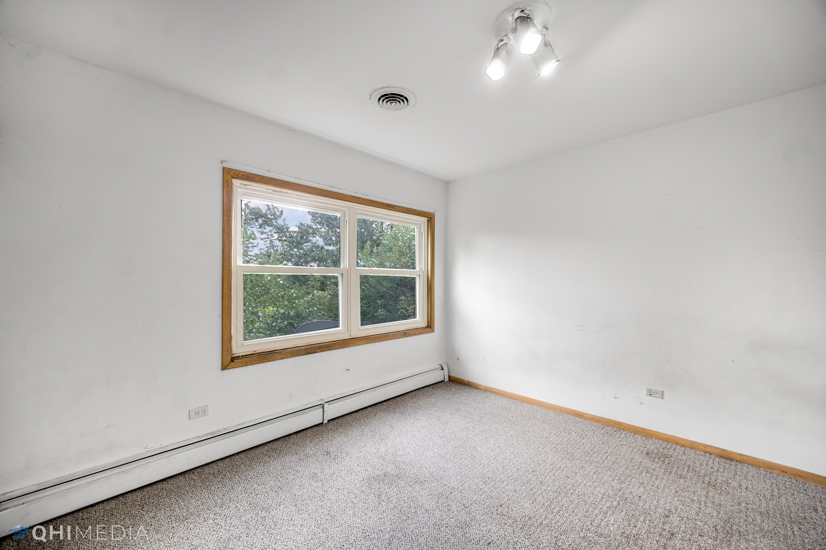18104 Park Avenue Homewood, IL 60430 - Photo 15 of 26 an empty room with a window