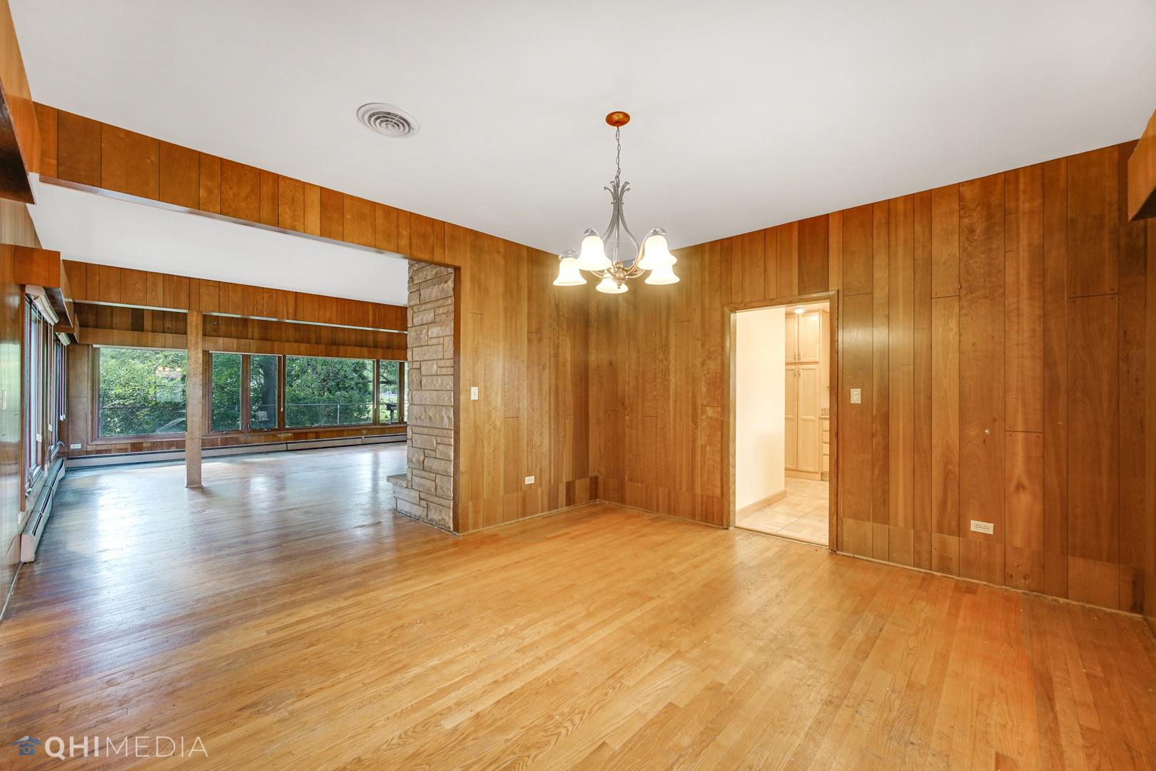 18104 Park Avenue Homewood, IL 60430 - Photo 6 of 26 a view of a room with wooden floor and large window