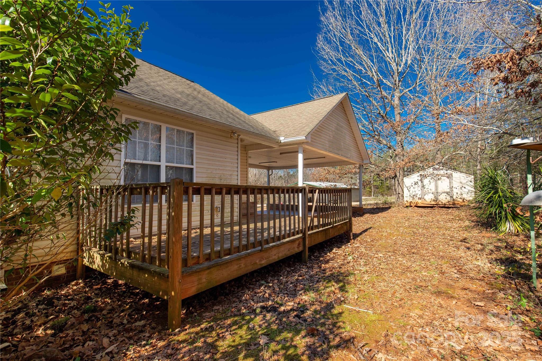 4641 Hickory Grove Road Sharon, SC 29742 - Photo 4 of 31 a view of a house with wooden fence and a trees