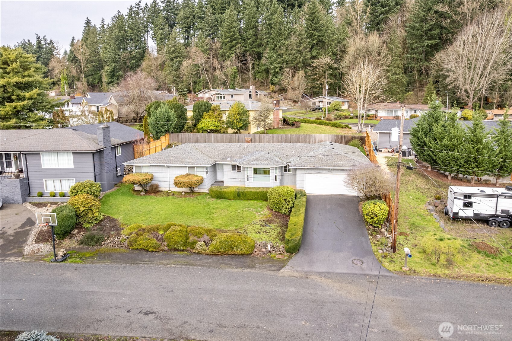 2120 Willow Place Longview, WA 98632 - Photo 22 of 28 a aerial view of a house with swimming pool and large trees