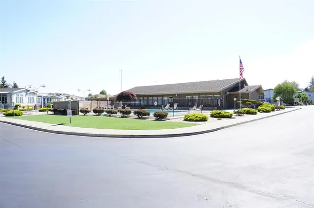 a view of a house with a swimming pool