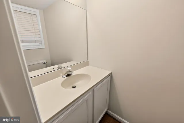 a bathroom with a sink and a vanity