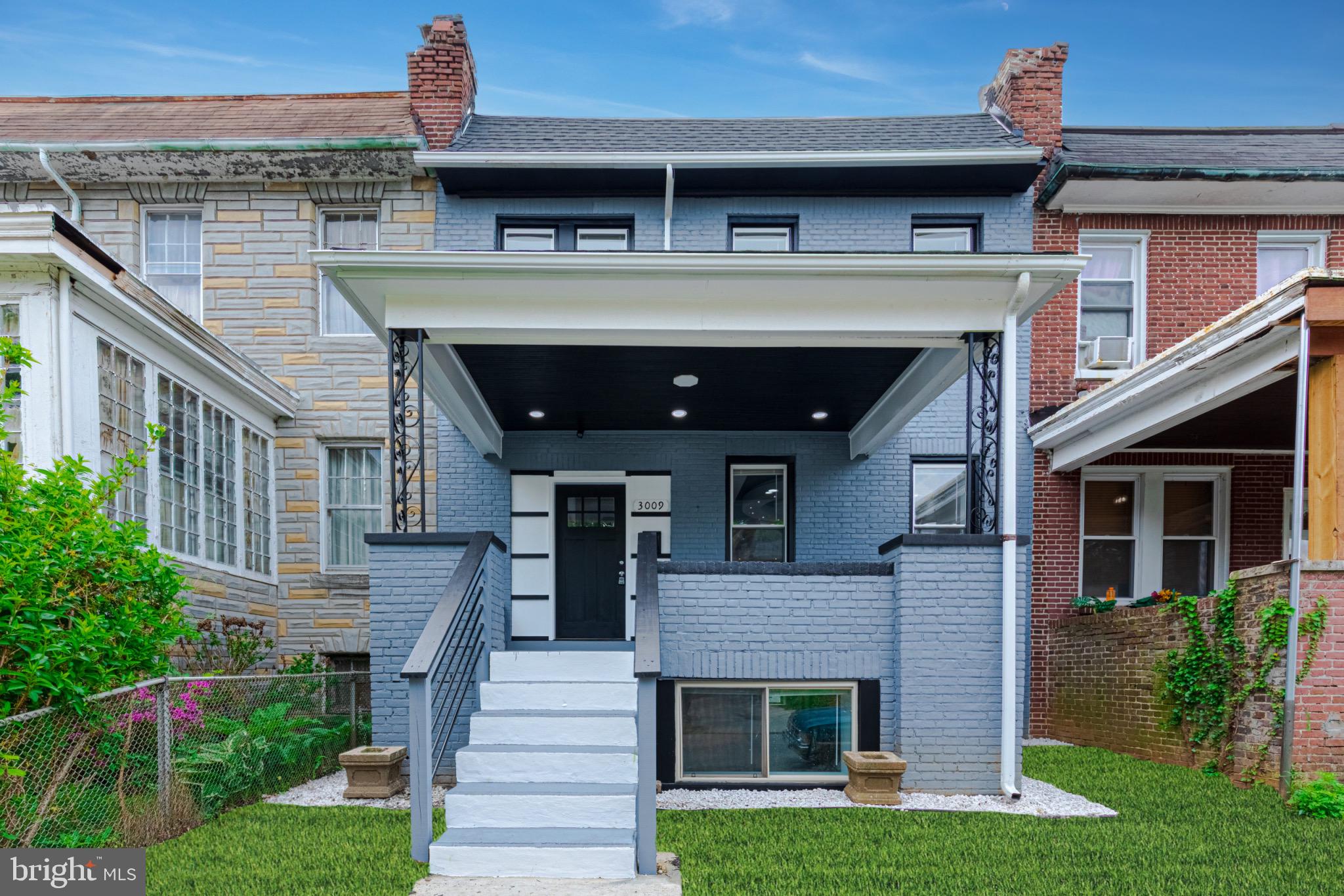 3009 Lyttleton Road Baltimore, MD 21216 - Photo 1 of 34 a front view of a house with garden