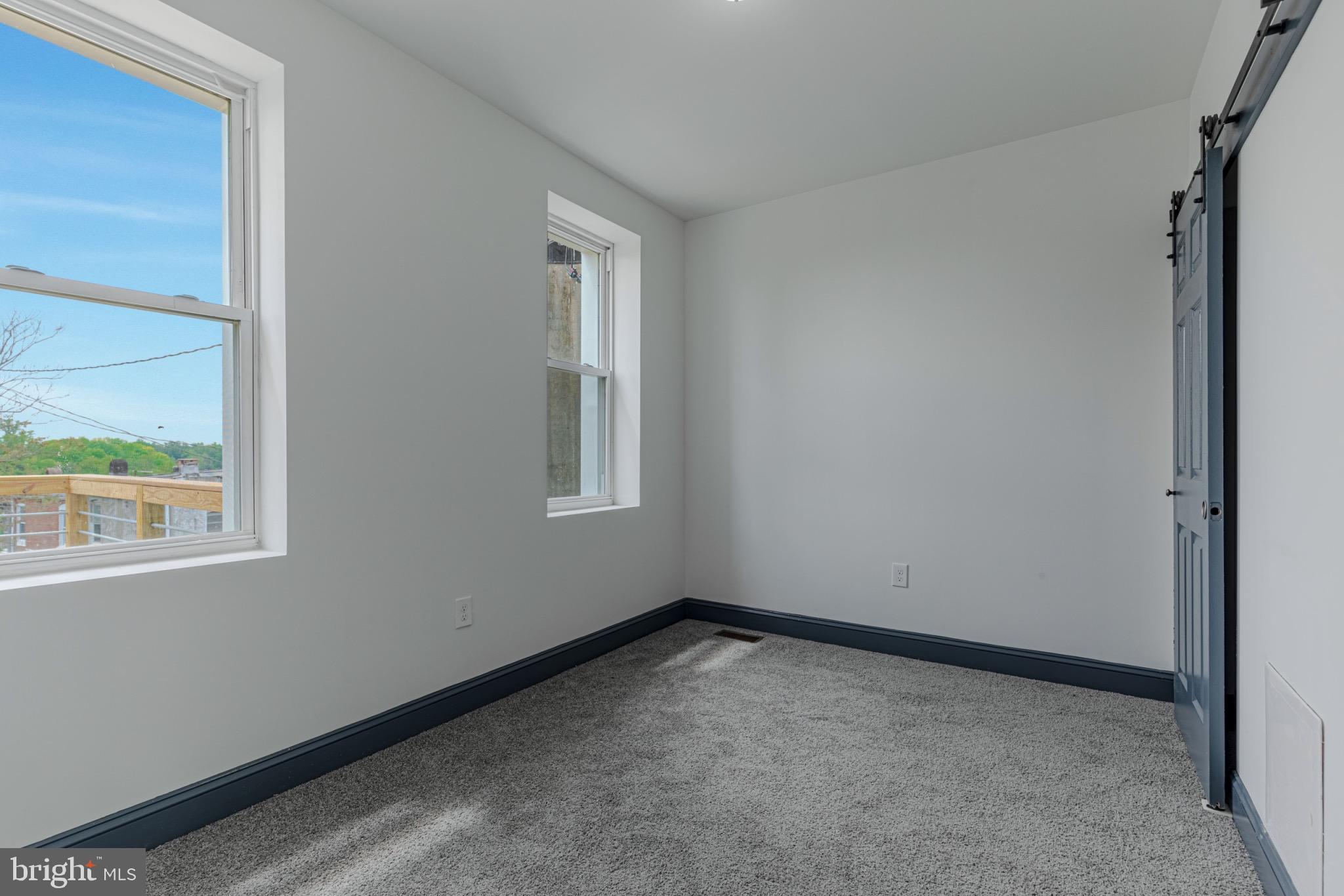 3009 Lyttleton Road Baltimore, MD 21216 - Photo 14 of 34 a view of empty room with window