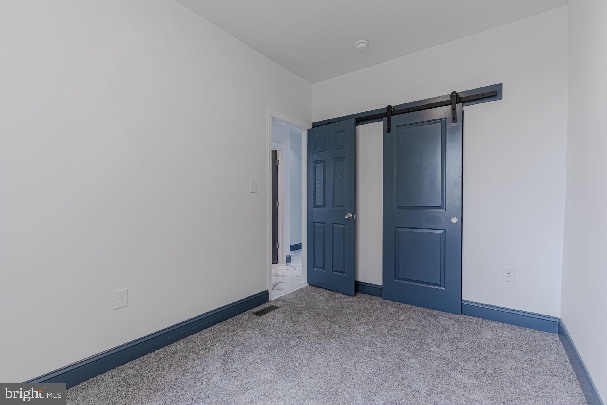 3009 Lyttleton Road Baltimore, MD 21216 - Photo 17 of 34 an empty room with closet area