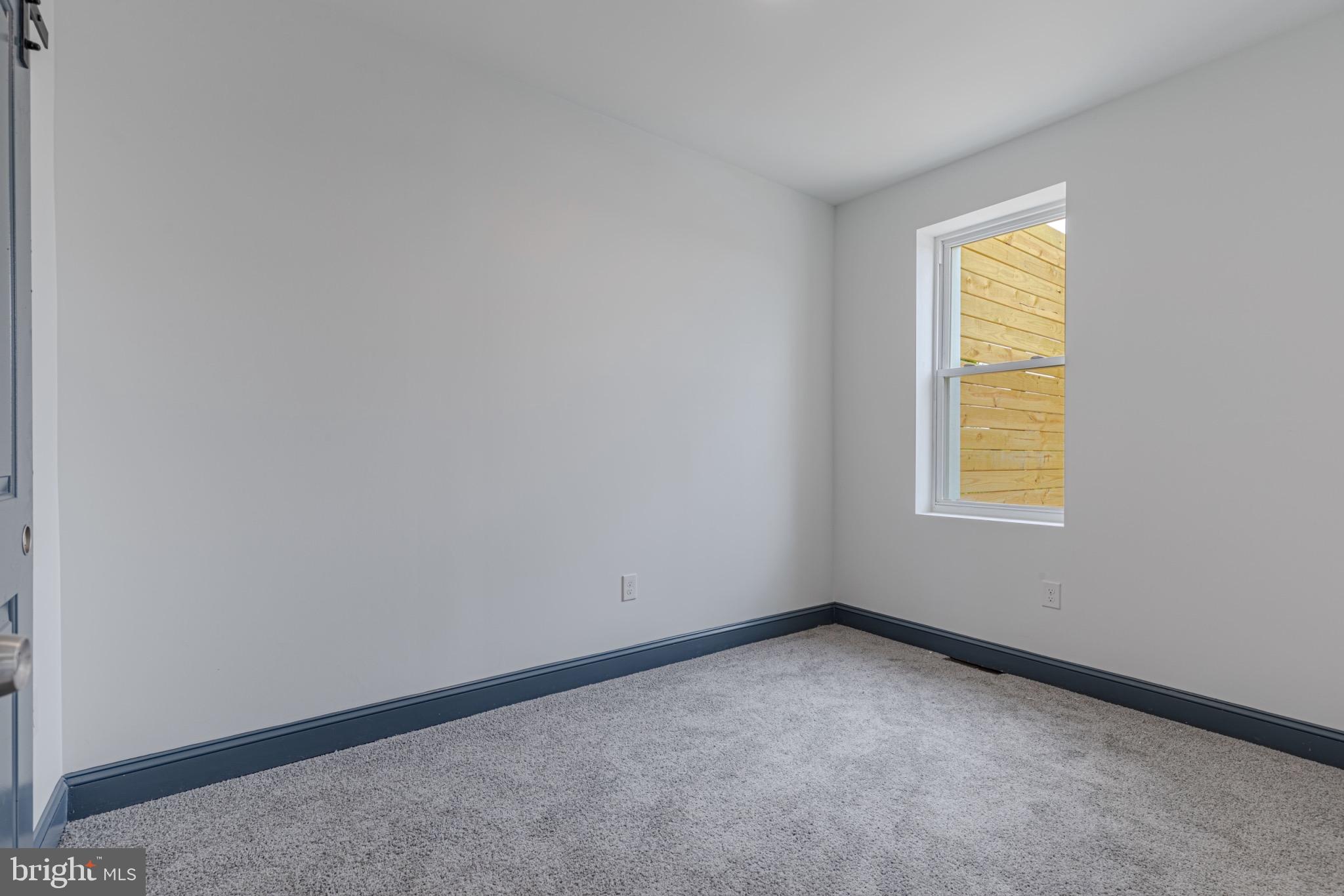 3009 Lyttleton Road Baltimore, MD 21216 - Photo 18 of 34 an empty room with a window