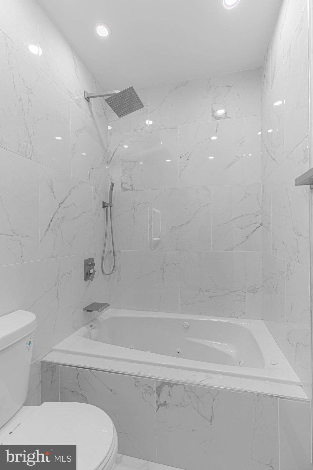 3009 Lyttleton Road Baltimore, MD 21216 - Photo 21 of 34 a bathroom with a toilet and a shower