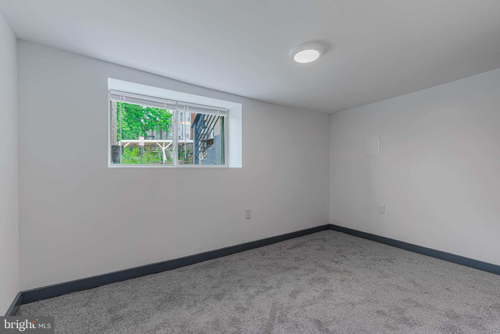 3009 Lyttleton Road Baltimore, MD 21216 - Photo 25 of 34 an empty room with a window
