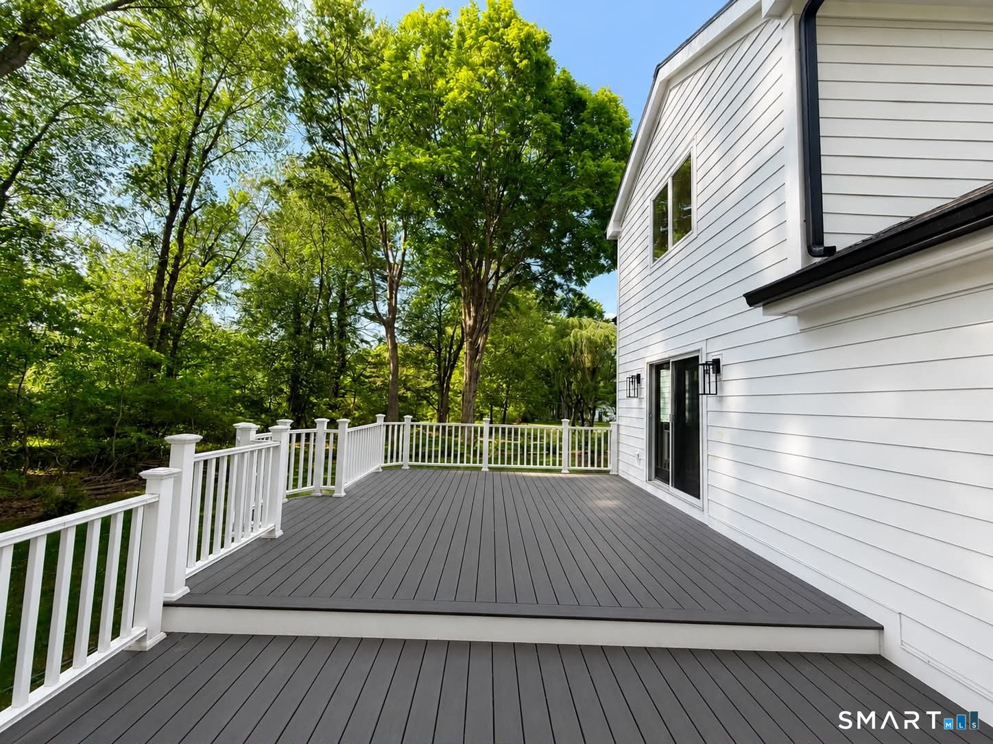 29 Flint Rock Road Stamford, CT 06903 - Photo 33 of 34 Maintenance-free deck. Fiber cement Hardie siding, PVC trim/handrails/balusters, composite decking.