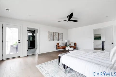 a potted plant sitting in front of a door