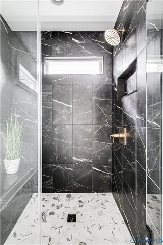 a view of a room with racks on the wall