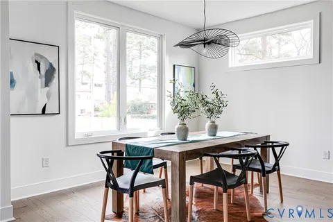 a kitchen with stainless steel appliances a sink stove and refrigerator