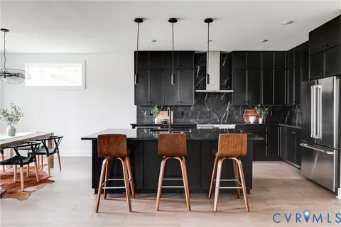 a kitchen with a stove and cabinets