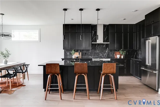 a kitchen with a stove and cabinets