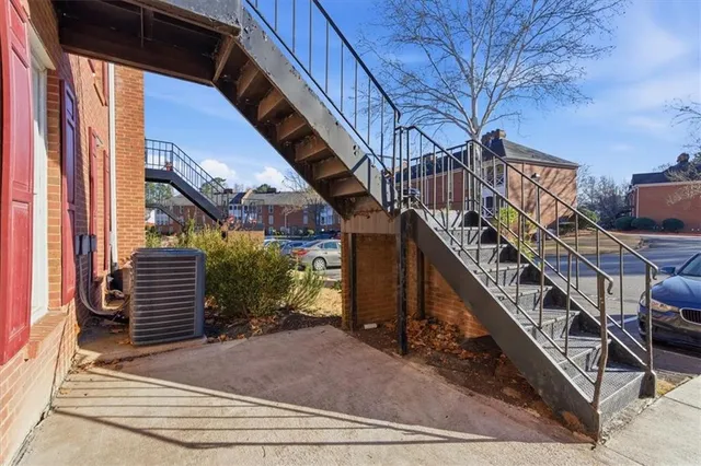 a view of stairs and with trees in the background
