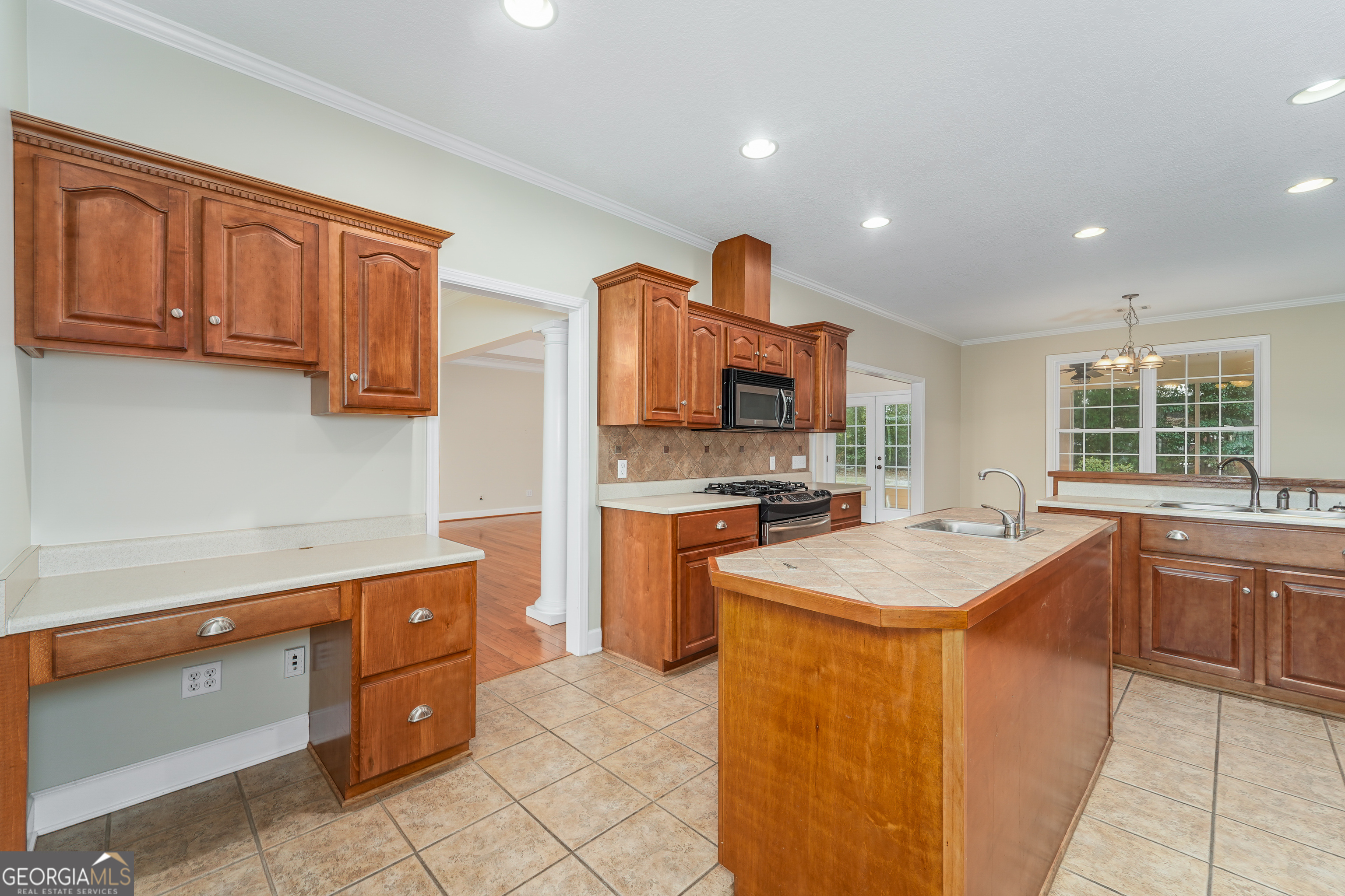 4023 Redstone Circle Blackshear, GA 31516 - Photo 13 of 27 a kitchen with a sink stove and cabinets