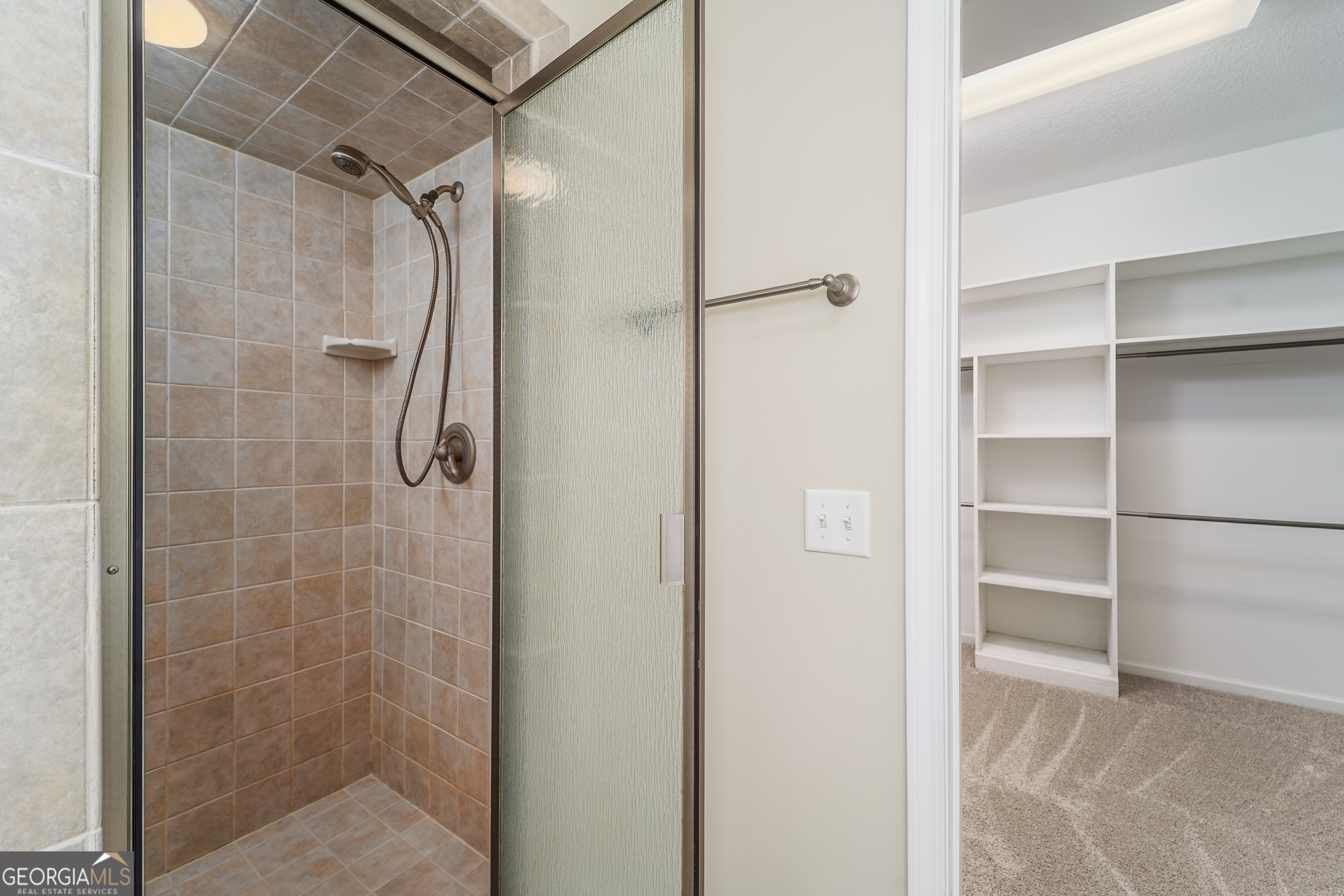 4023 Redstone Circle Blackshear, GA 31516 - Photo 17 of 27 a bathroom with a glass shower door