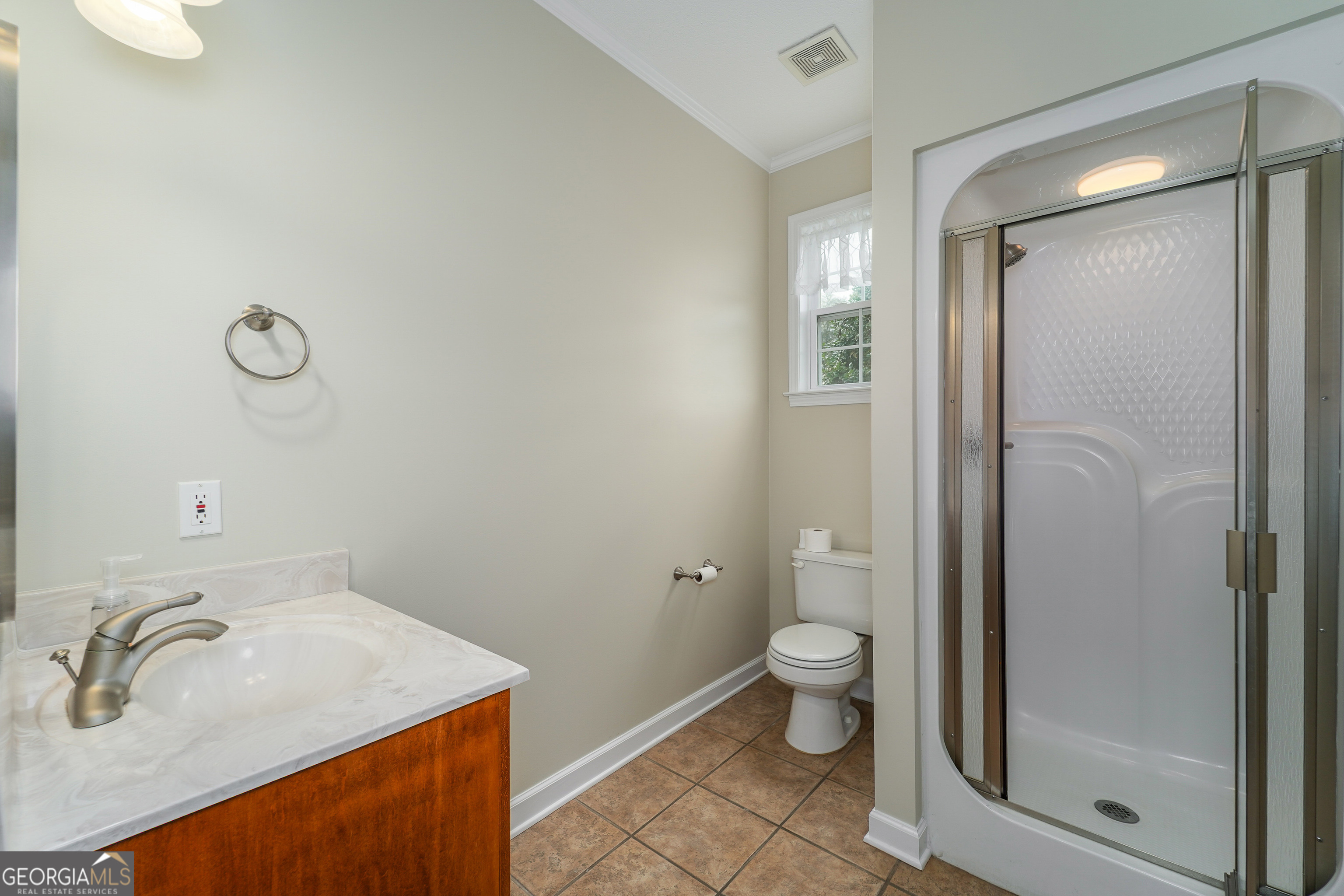 4023 Redstone Circle Blackshear, GA 31516 - Photo 24 of 27 a bathroom with a sink a toilet and shower