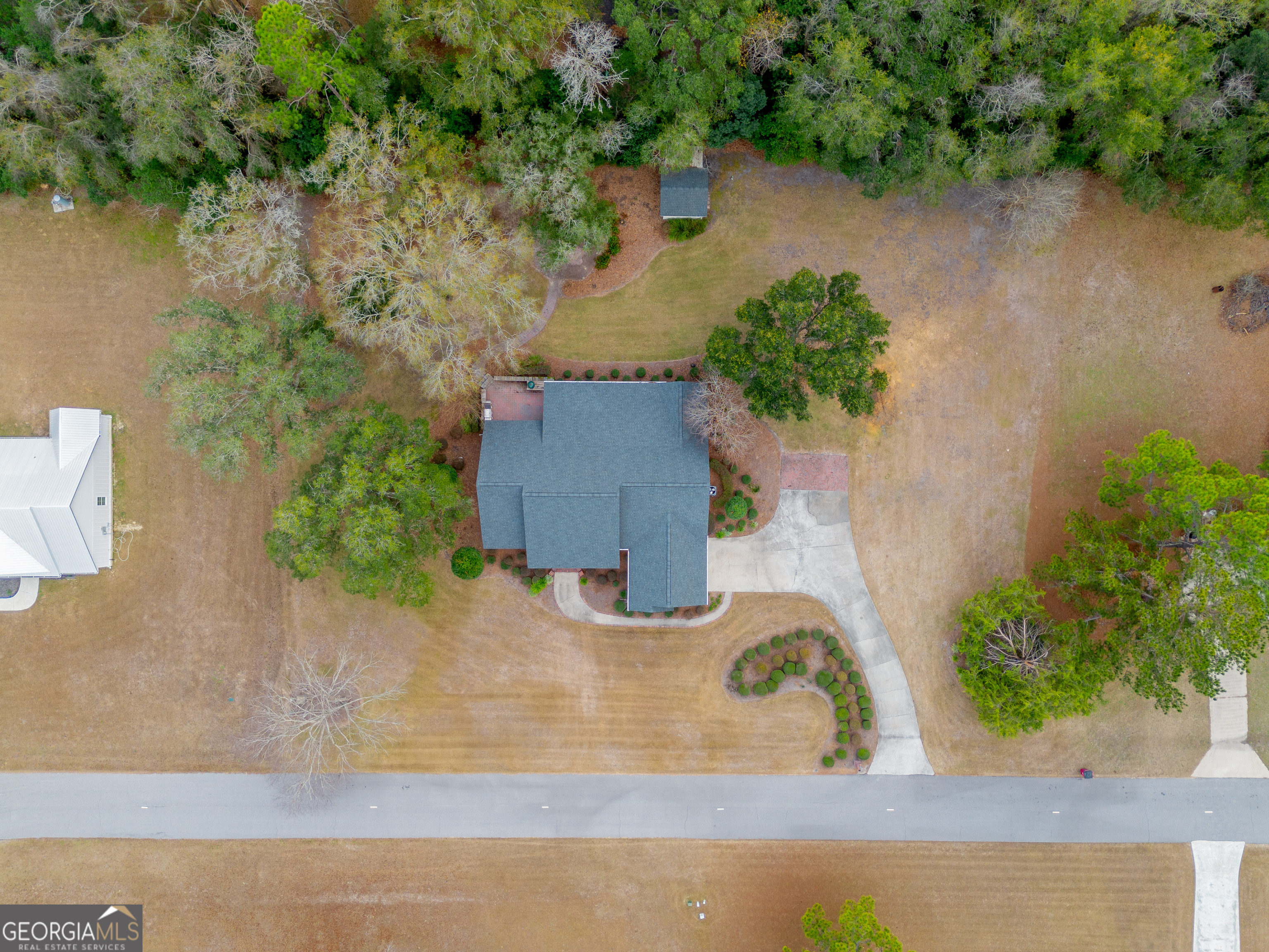 4023 Redstone Circle Blackshear, GA 31516 - Photo 27 of 27 an aerial view of a house with a yard and lake view