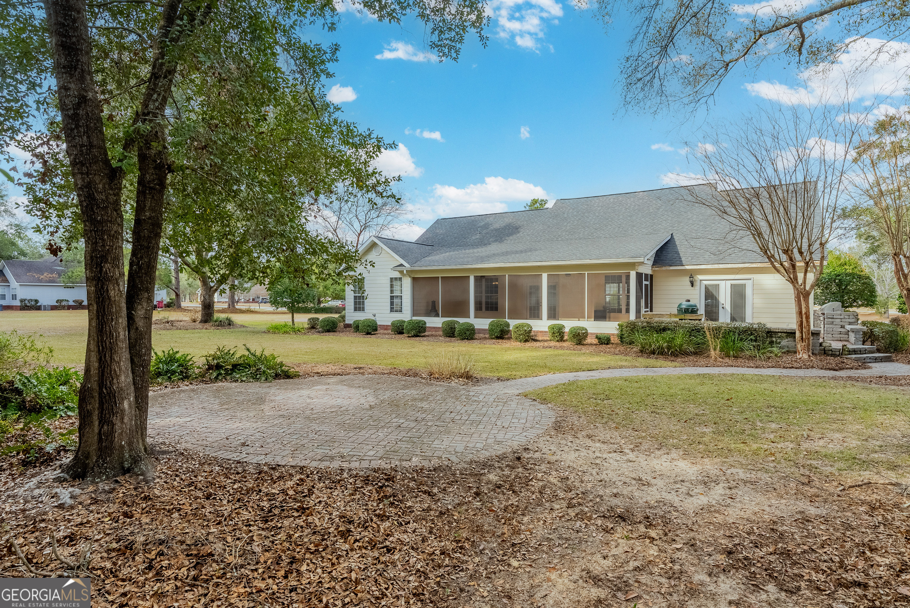 4023 Redstone Circle Blackshear, GA 31516 - Photo 5 of 27 a front view of a house with a garden