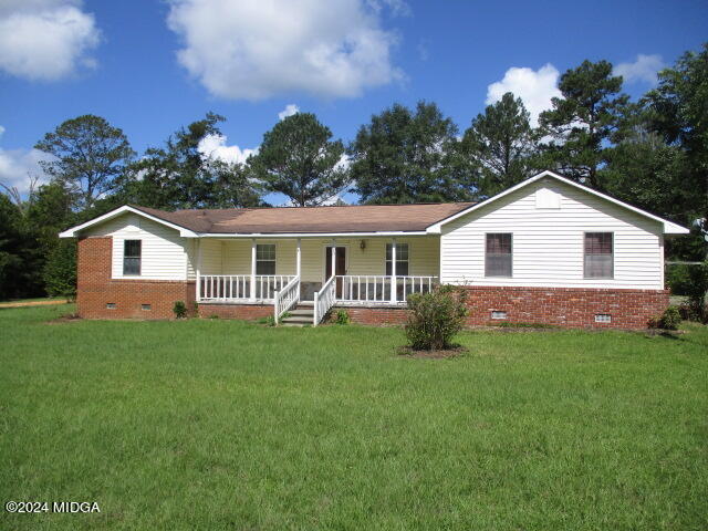 923 Chappell Mill Road Montrose, GA 31065 - Photo 1 of 21 a view of a house with a yard