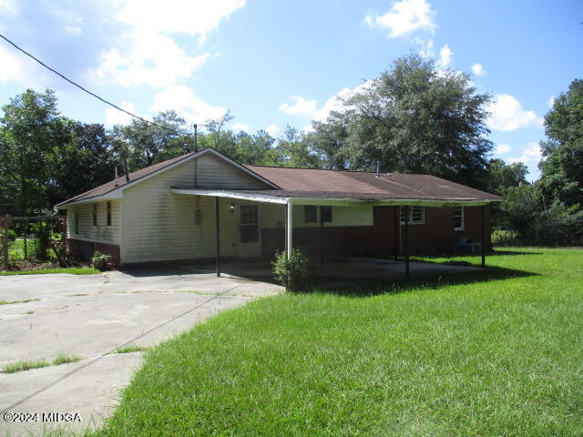 923 Chappell Mill Road Montrose, GA 31065 - Photo 21 of 21 a view of a house with a yard and large tree