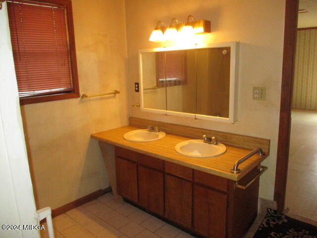 923 Chappell Mill Road Montrose, GA 31065 - Photo 10 of 21 a bathroom with a sink and a mirror
