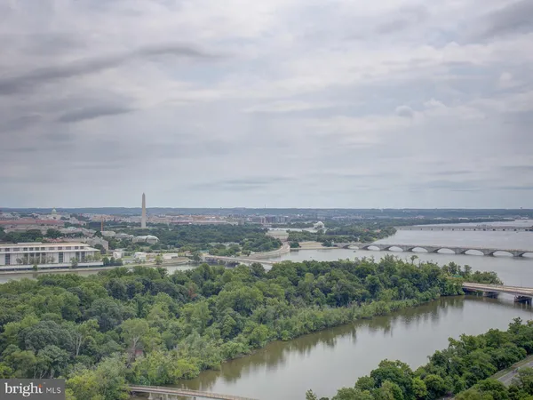 an aerial view of residential building and trees