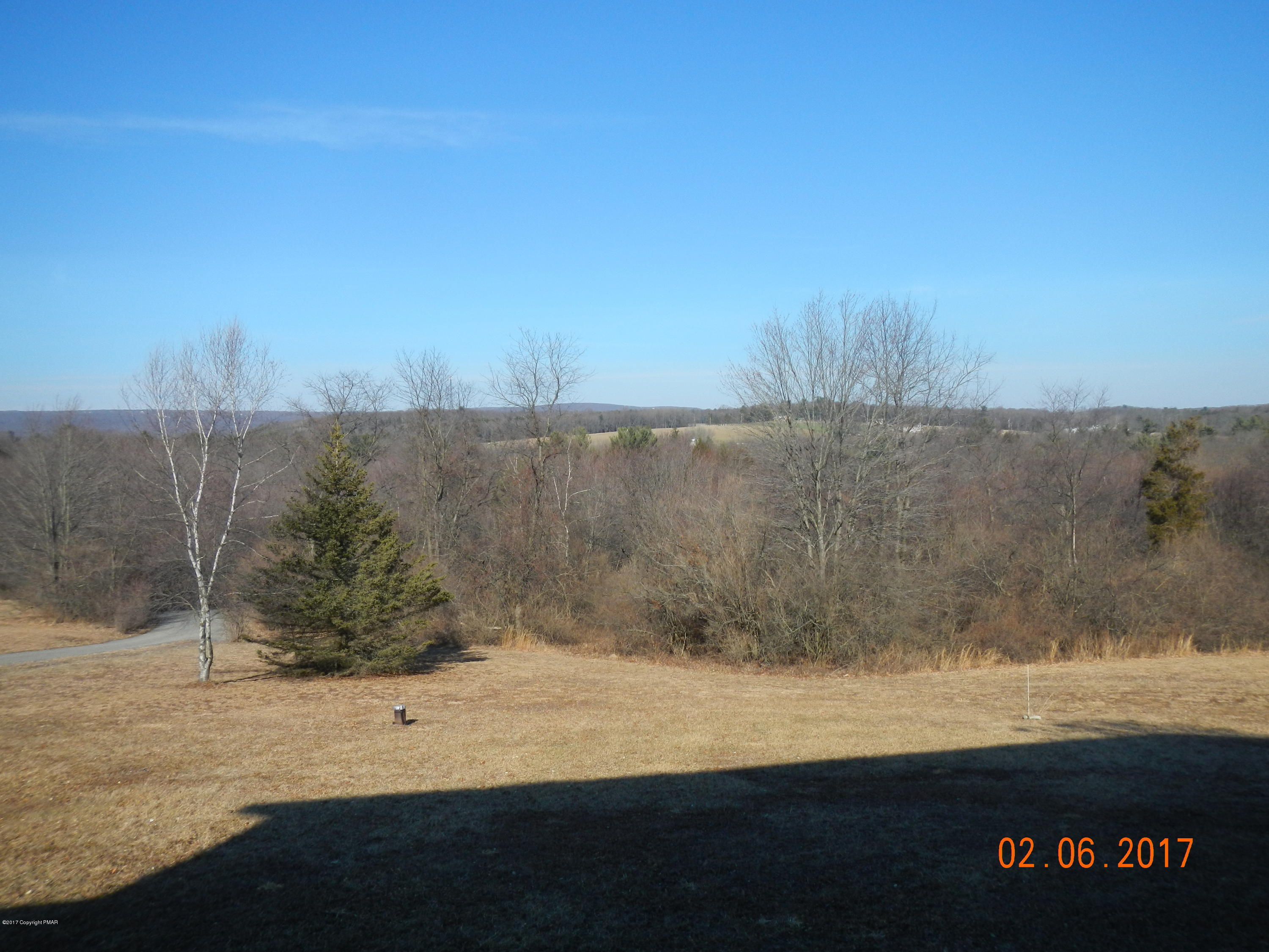 202 Rustic Road Kunkletown, PA 18058 - Photo 15 of 19 a view of a yard next to a lake view
