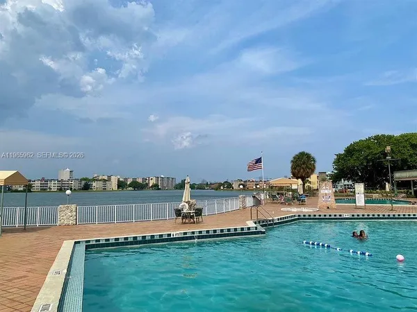 a view of a lake with a beach