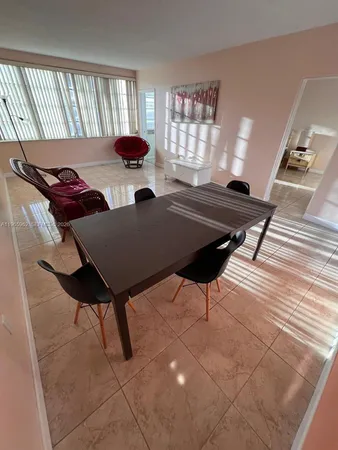 a view of a workspace with furniture