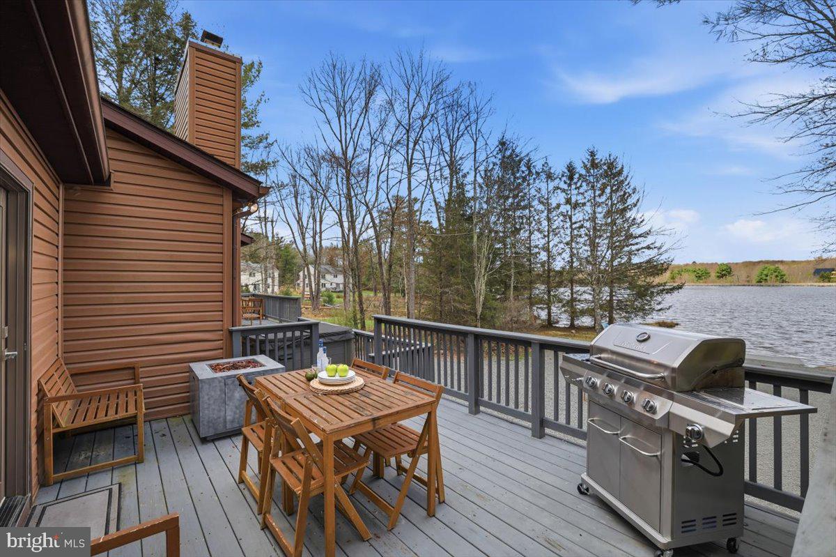 128 Lidio Road Blakeslee, PA 18610 - Photo 1 of 63 a view of a patio with a table and chairs
