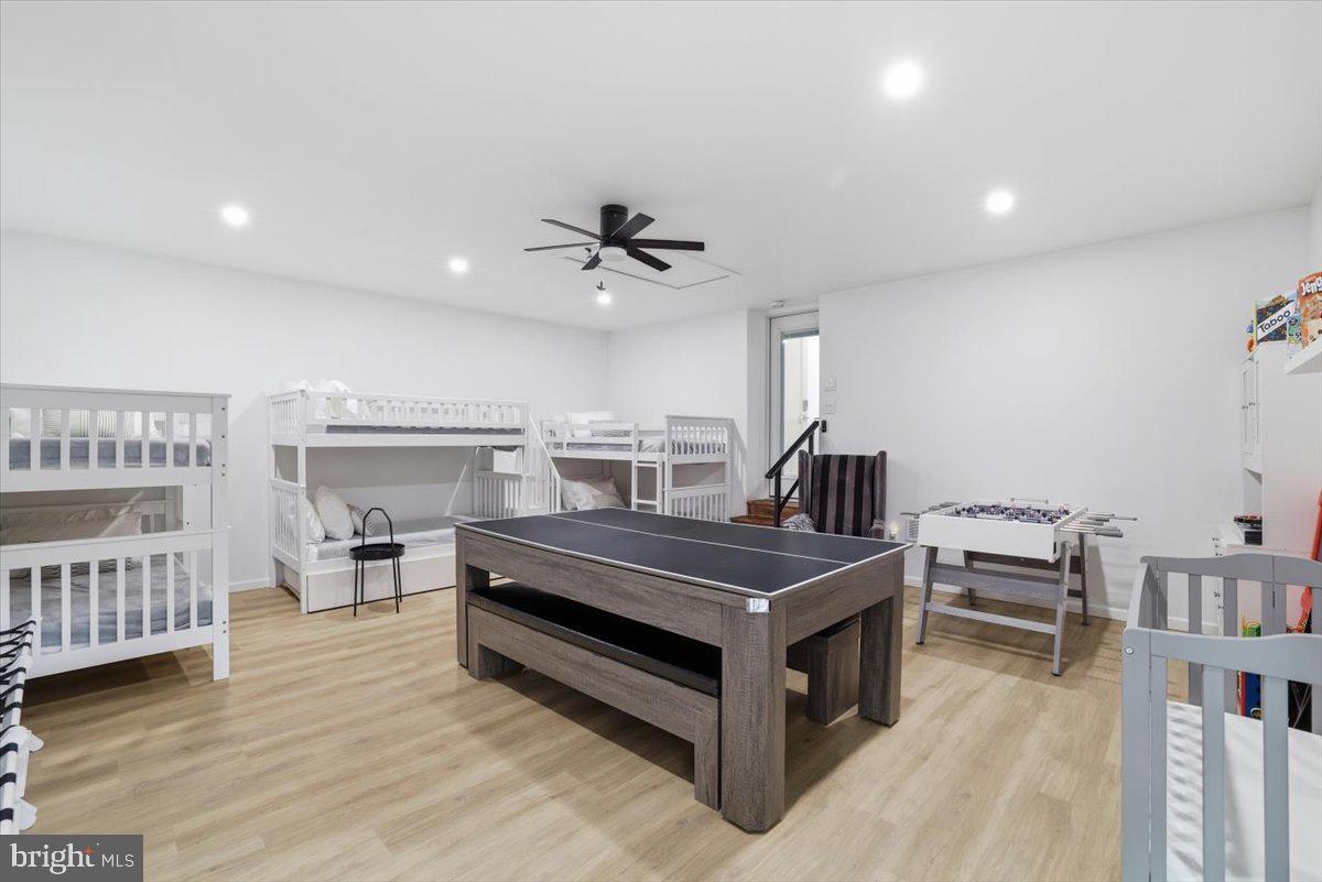 128 Lidio Road Blakeslee, PA 18610 - Photo 22 of 63 a view of hotel room with furniture and a ceiling fan