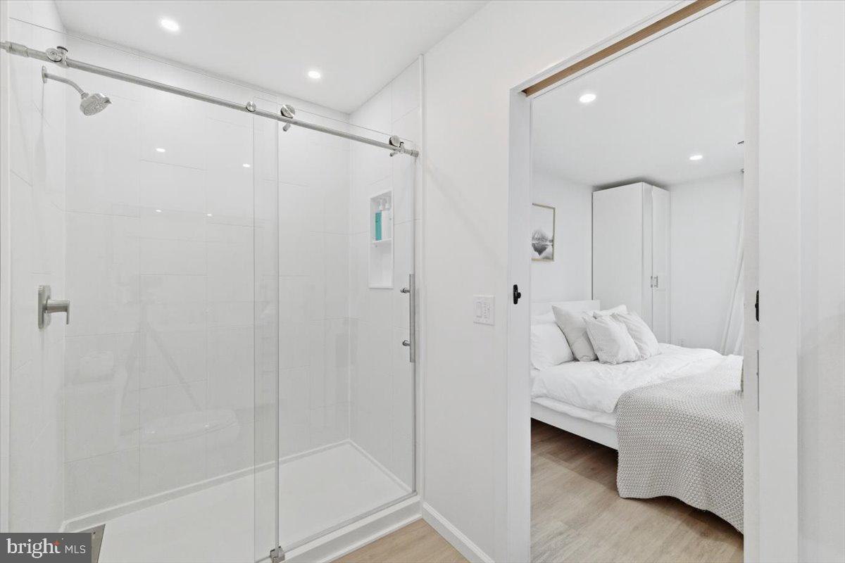 128 Lidio Road Blakeslee, PA 18610 - Photo 32 of 63 a bathroom with a shower and a glass door