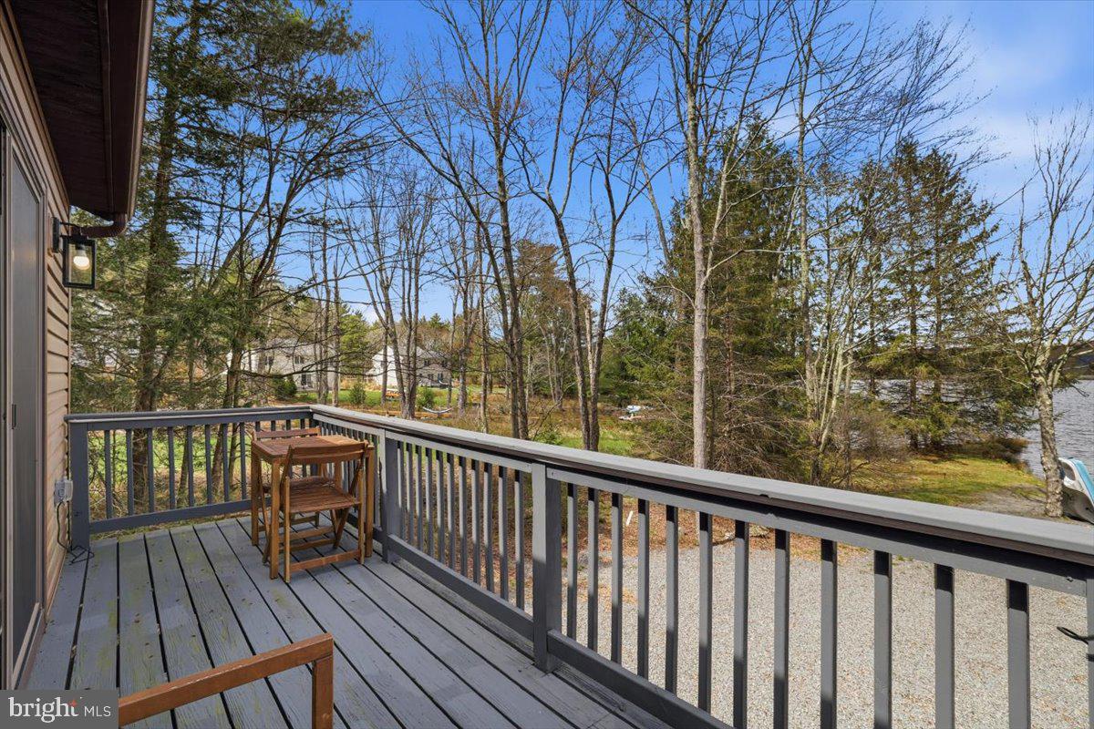128 Lidio Road Blakeslee, PA 18610 - Photo 44 of 63 a view of balcony with wooden floor and fence
