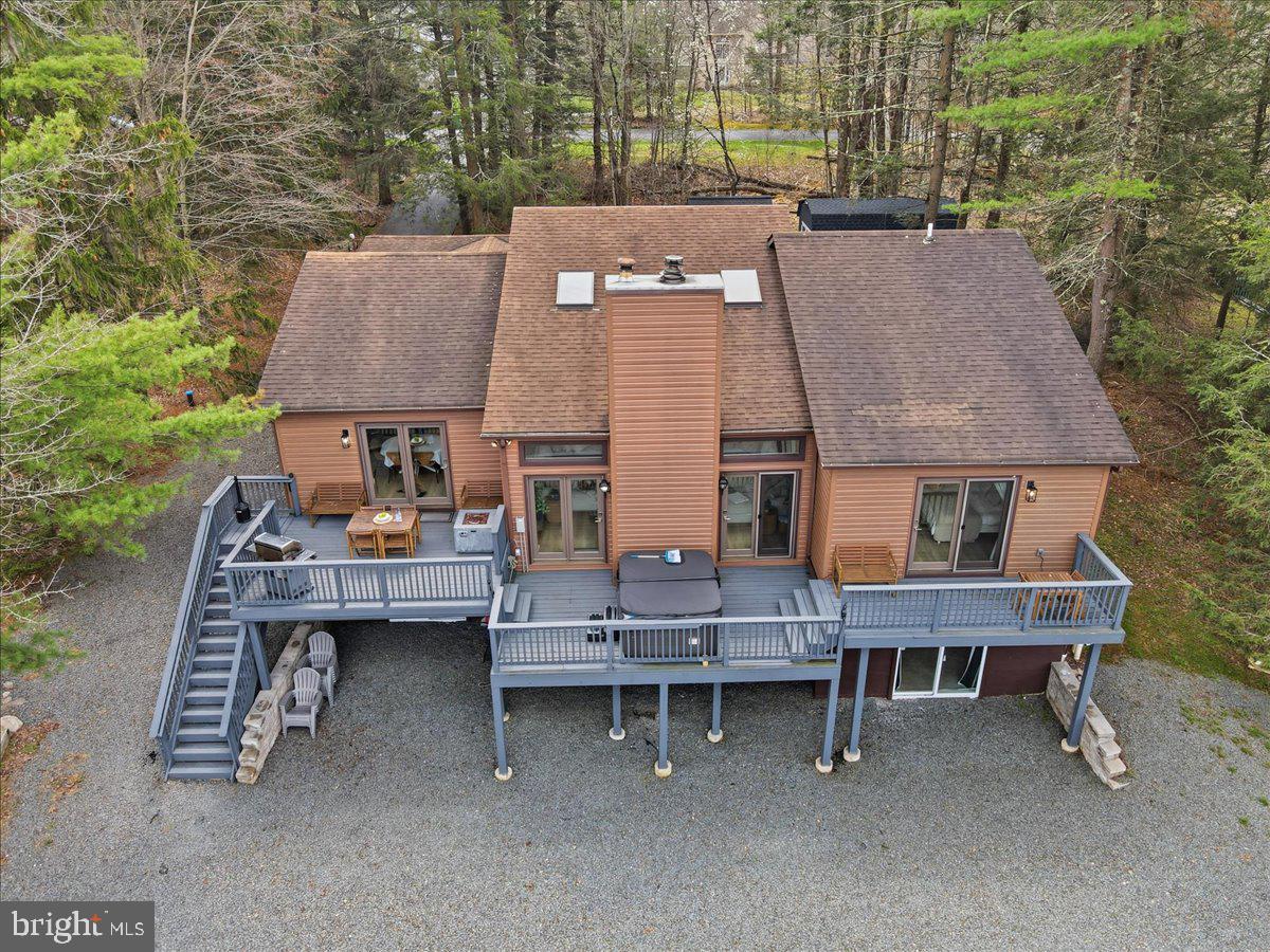 128 Lidio Road Blakeslee, PA 18610 - Photo 49 of 63 a backyard of a house with outdoor seating