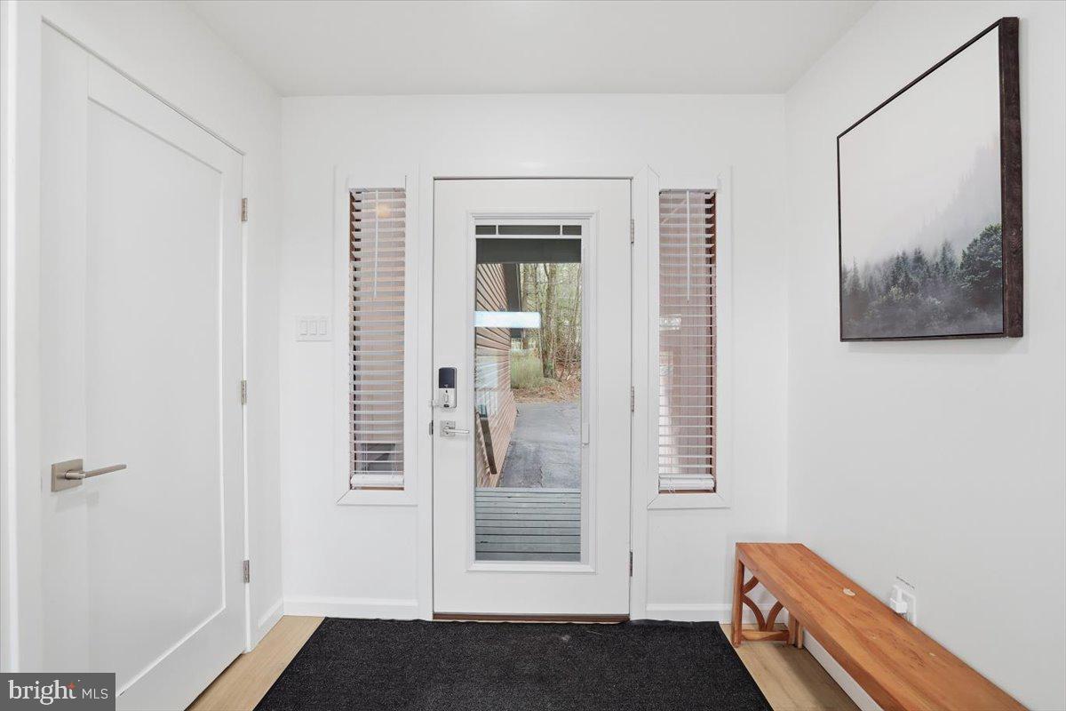 128 Lidio Road Blakeslee, PA 18610 - Photo 5 of 63 a view of room with window and hallway