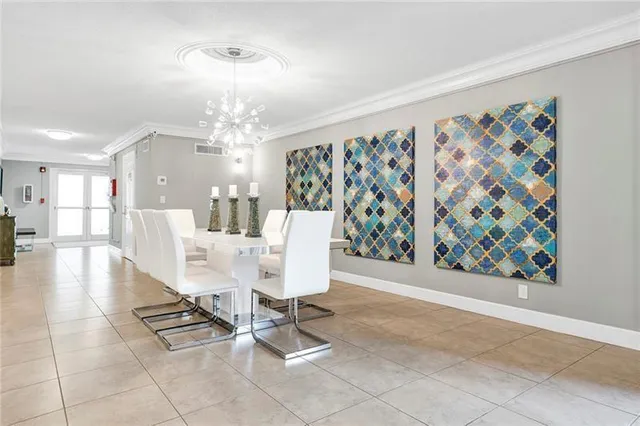 a view of a backyard with potted plants