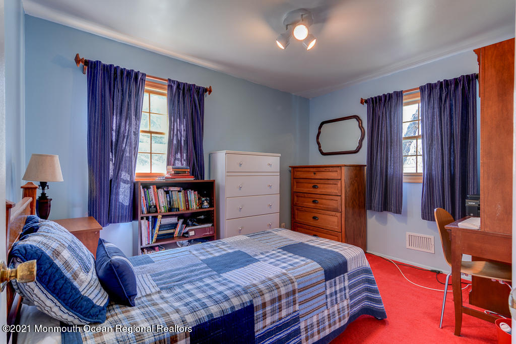 9 Neal Street Jackson, NJ 08527 - Photo 11 of 22 a bedroom with a bed and furniture