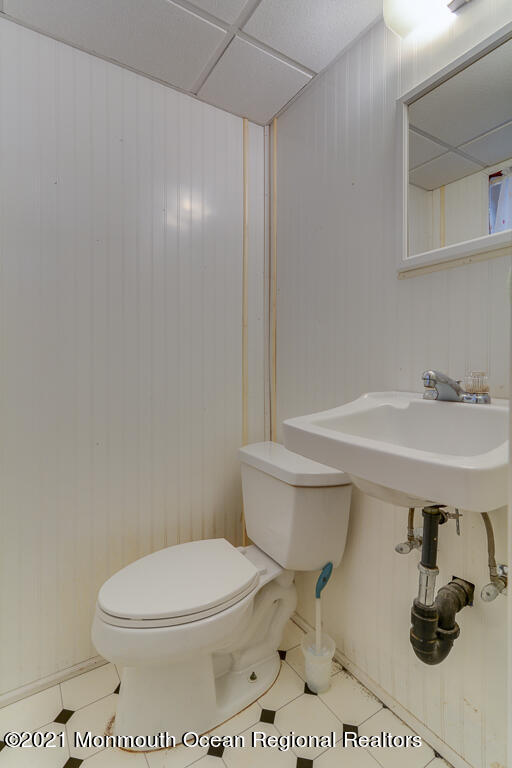 9 Neal Street Jackson, NJ 08527 - Photo 16 of 22 a bathroom with a sink and a toilet