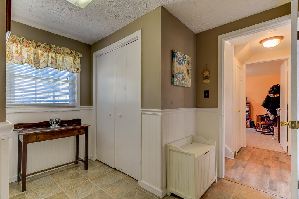 9 Neal Street Jackson, NJ 08527 - Photo 19 of 22 a view of a hallway and a livingroom with furniture