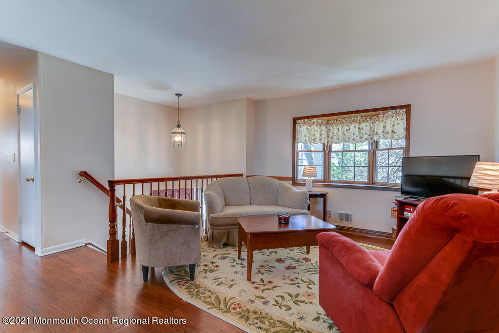 9 Neal Street Jackson, NJ 08527 - Photo 3 of 22 a living room with furniture and a fireplace