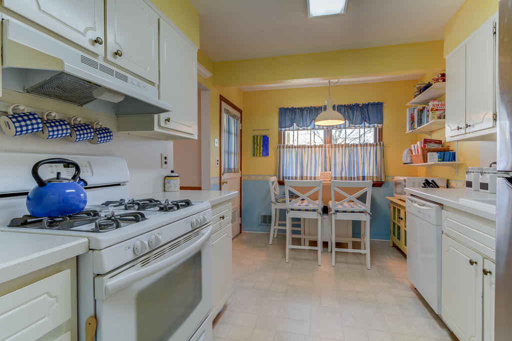 9 Neal Street Jackson, NJ 08527 - Photo 9 of 22 a kitchen with a stove and cabinets