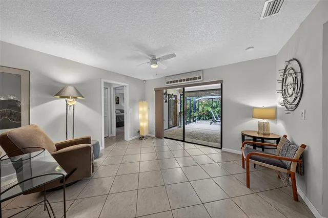 a view of a room with workspace and toys