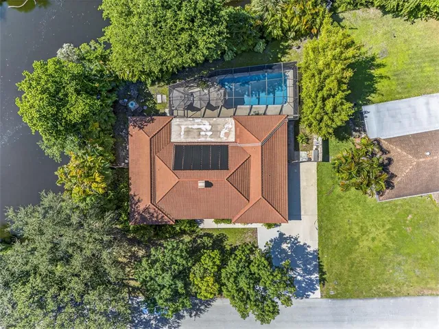 a kitchen with stainless steel appliances granite countertop a sink and stove top oven